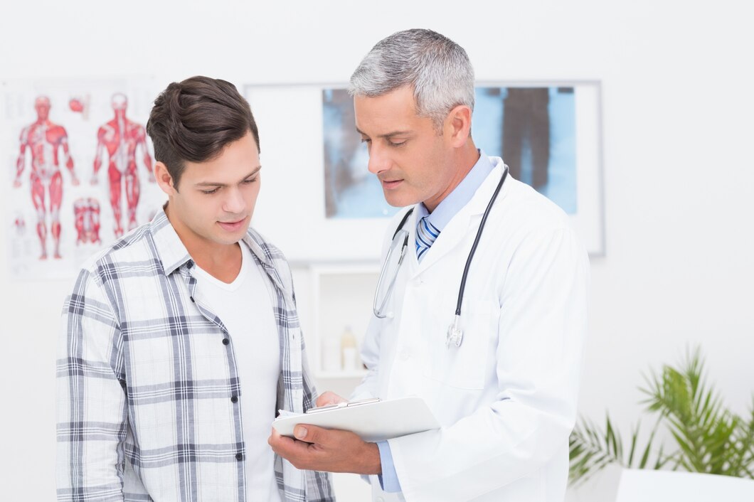 doctor-showing-clipboard-his-patient_13339-123353