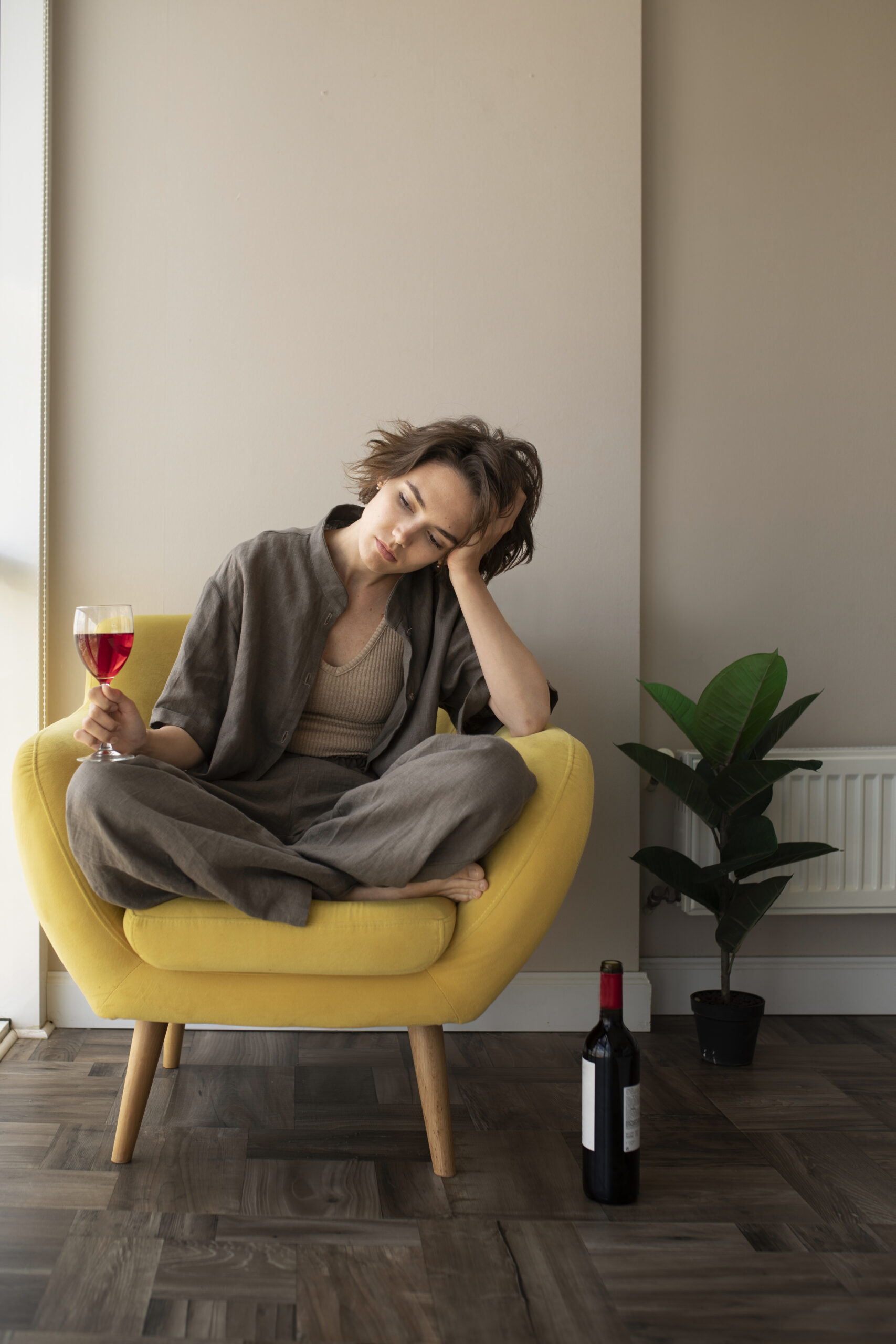 full-shot-woman-holding-wine-glass